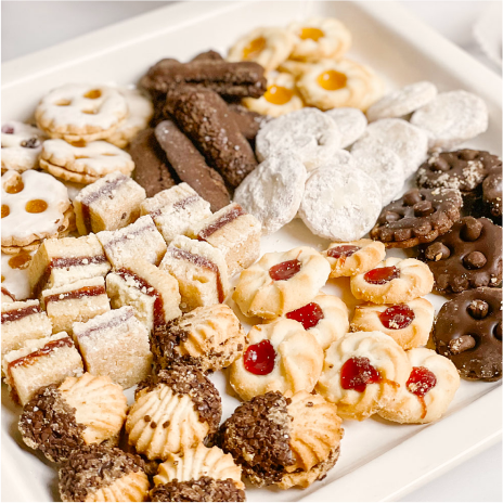 an assortment of cookies dusted with powdered sugar